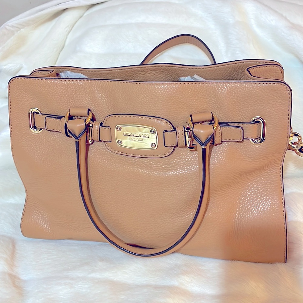 Michael kors  medium tan color very spacious inside